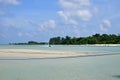 Beach landscape with beautiful clouds and water surface Royalty Free Stock Photo